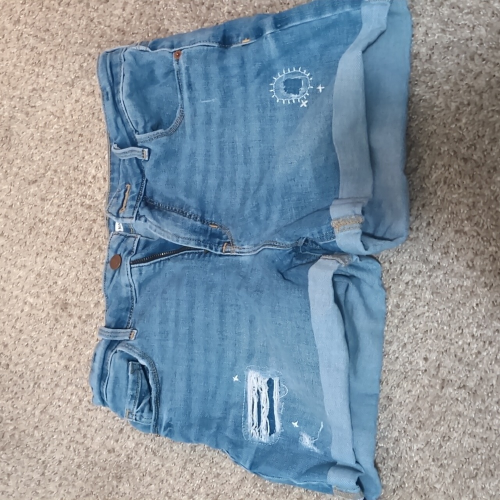 Medium wash ripped shorts, high waist